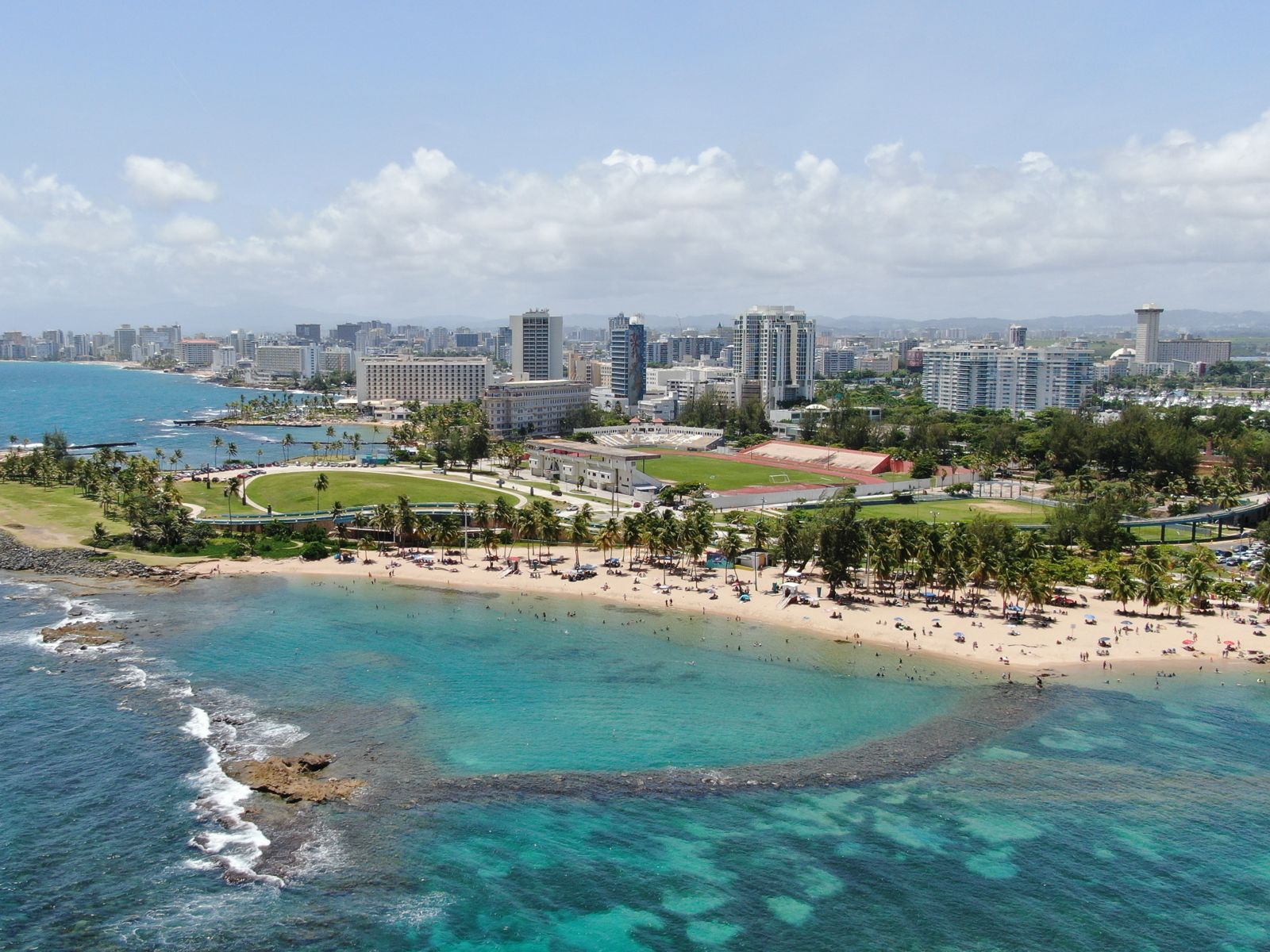 Escambrón Beach aerial – urban reef snorkeling in San Juan