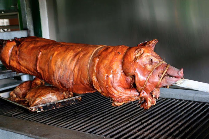 Lechonera El Mojito tray of crispy pork and sides