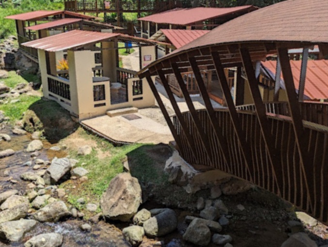 Lechonera El Rancho Original exterior with spit-roasting pigs