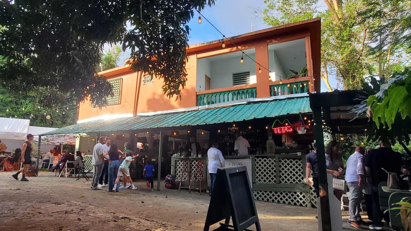 Teta's neon bar exterior at night